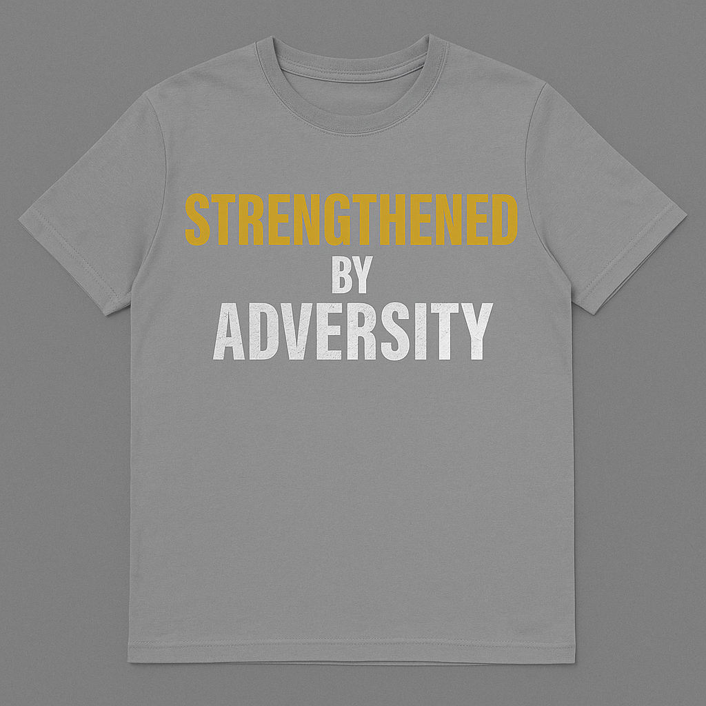 “Strengthened by Adversity” Motivational Tee – Unisex | Gold & White Distressed Design